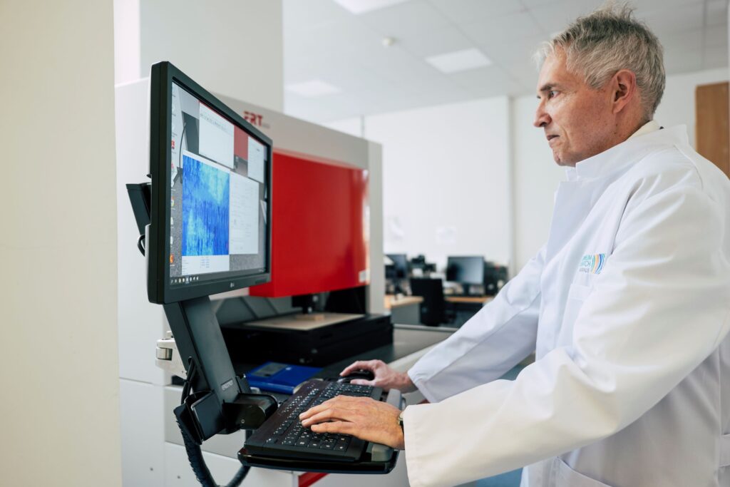 3D surface characterization using white light interferometry and chromatic confocal sensors for film thickness, roughness, and flatness measurements.
