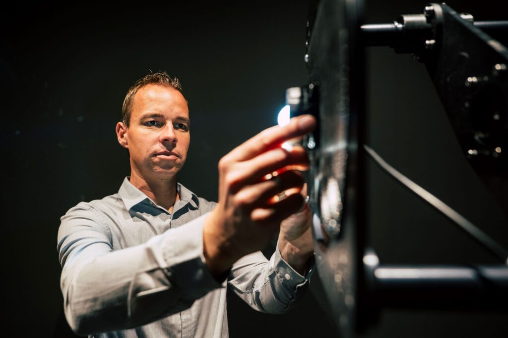 Goniophotometer for angle-dependent measurement of photometric properties of luminaires.